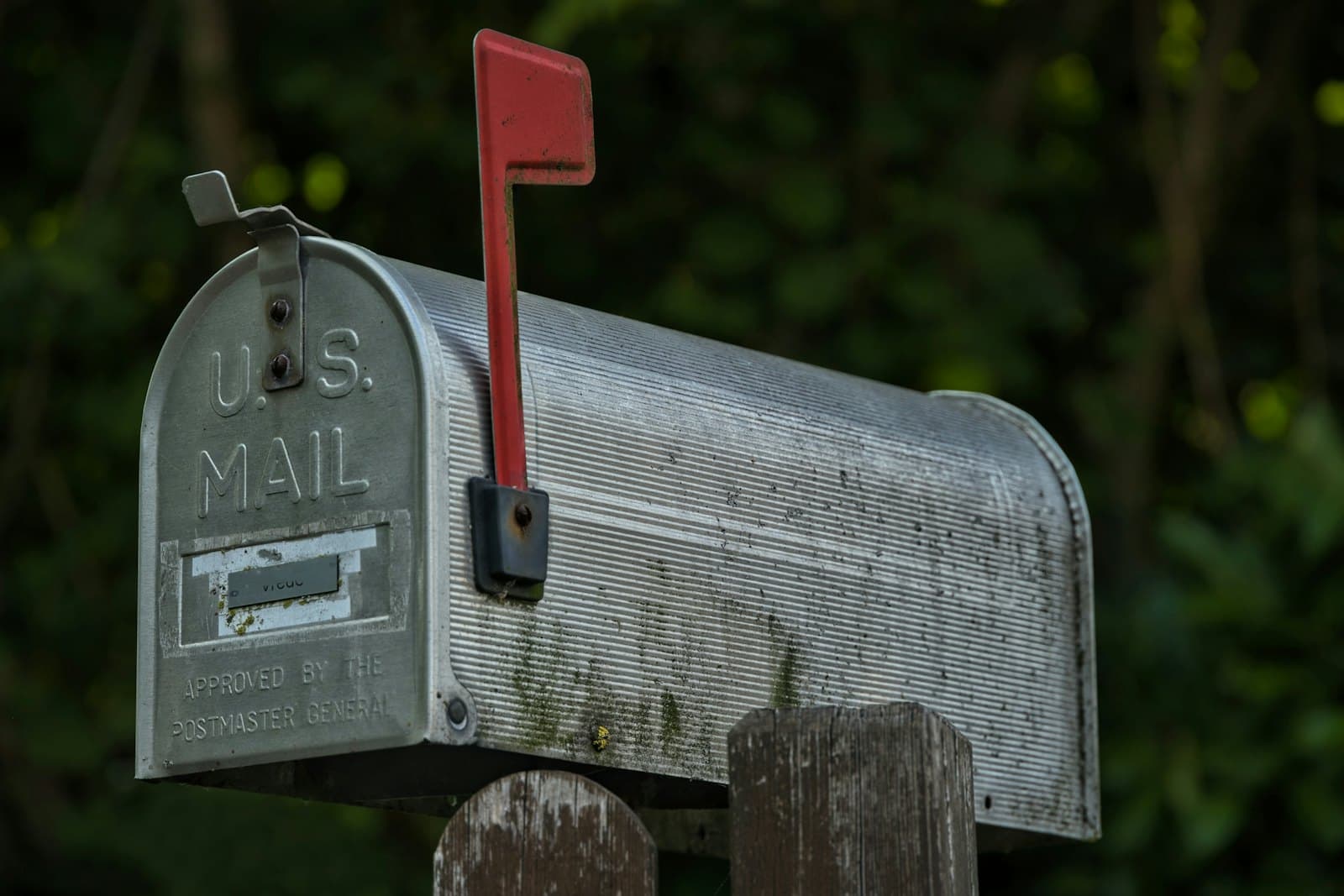 A US mailbox with its red flag raised: a letter has arrived